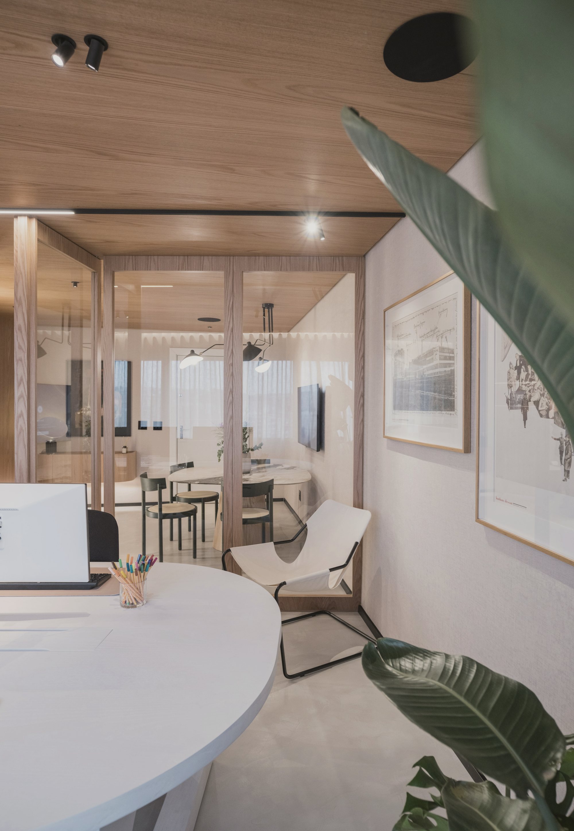 A bright meeting room with a wooden table